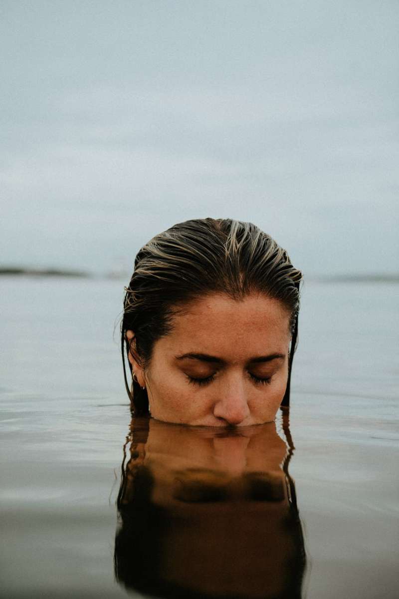woman inside lake